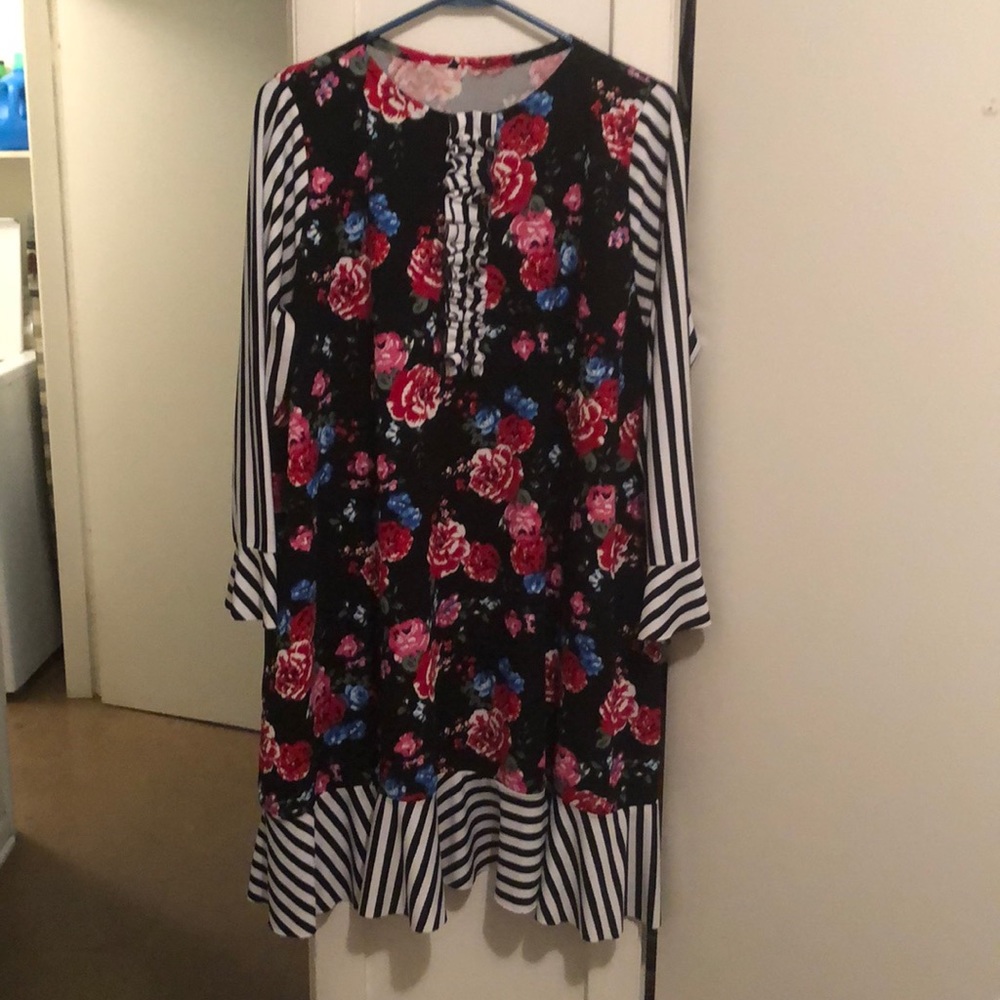 Black and white striped/floral outfit.